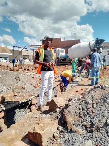 Dawgthemba team managing groundwork on an active construction site