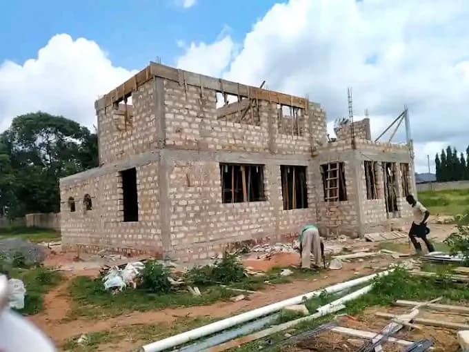 Brick structure under construction by Dawgthemba Construction